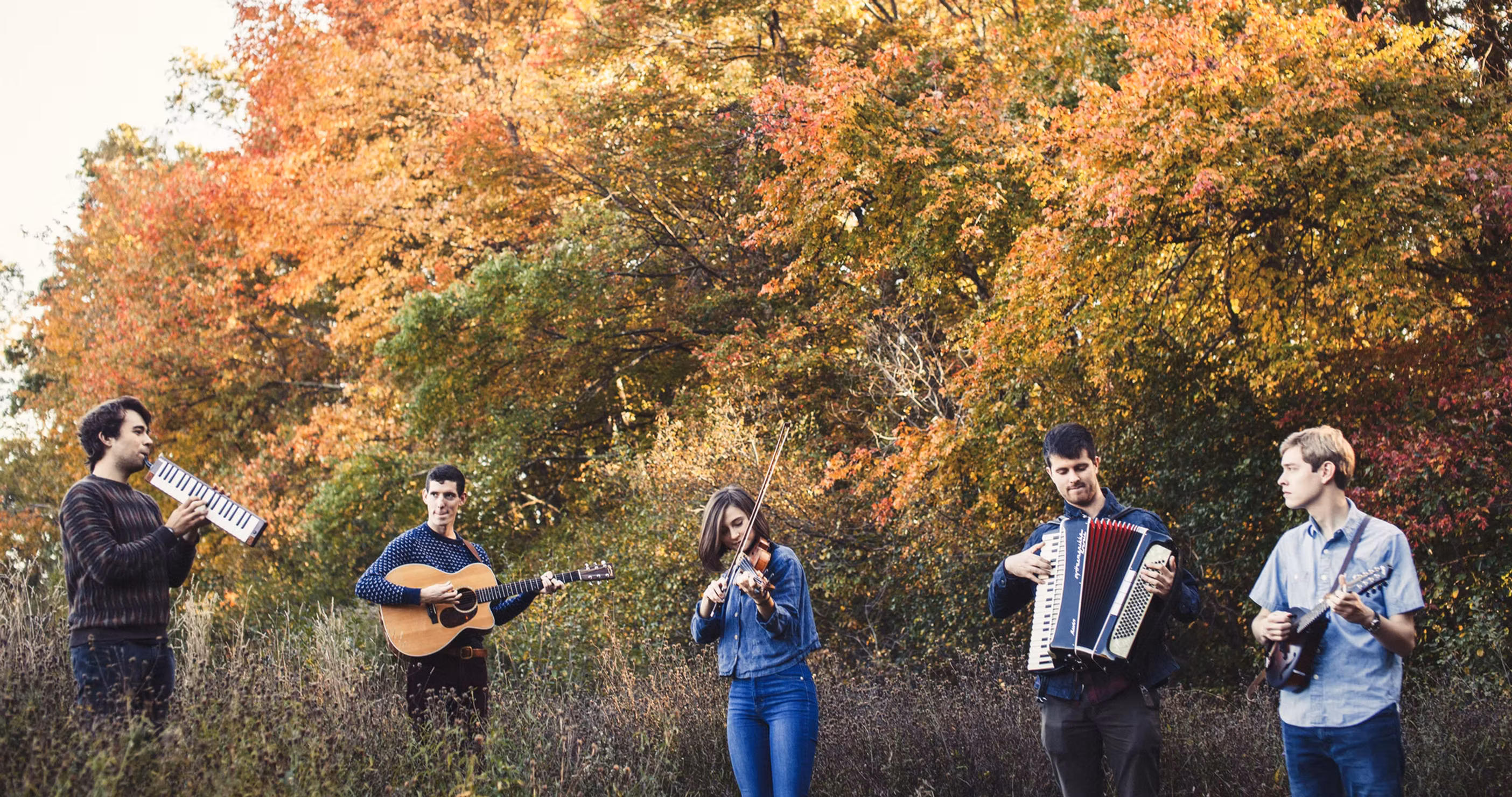 Pumpkin Bread band performing outdoors in autumn